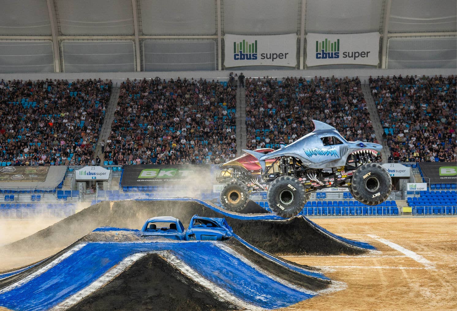 Monster Jam - Monster trucks in midair