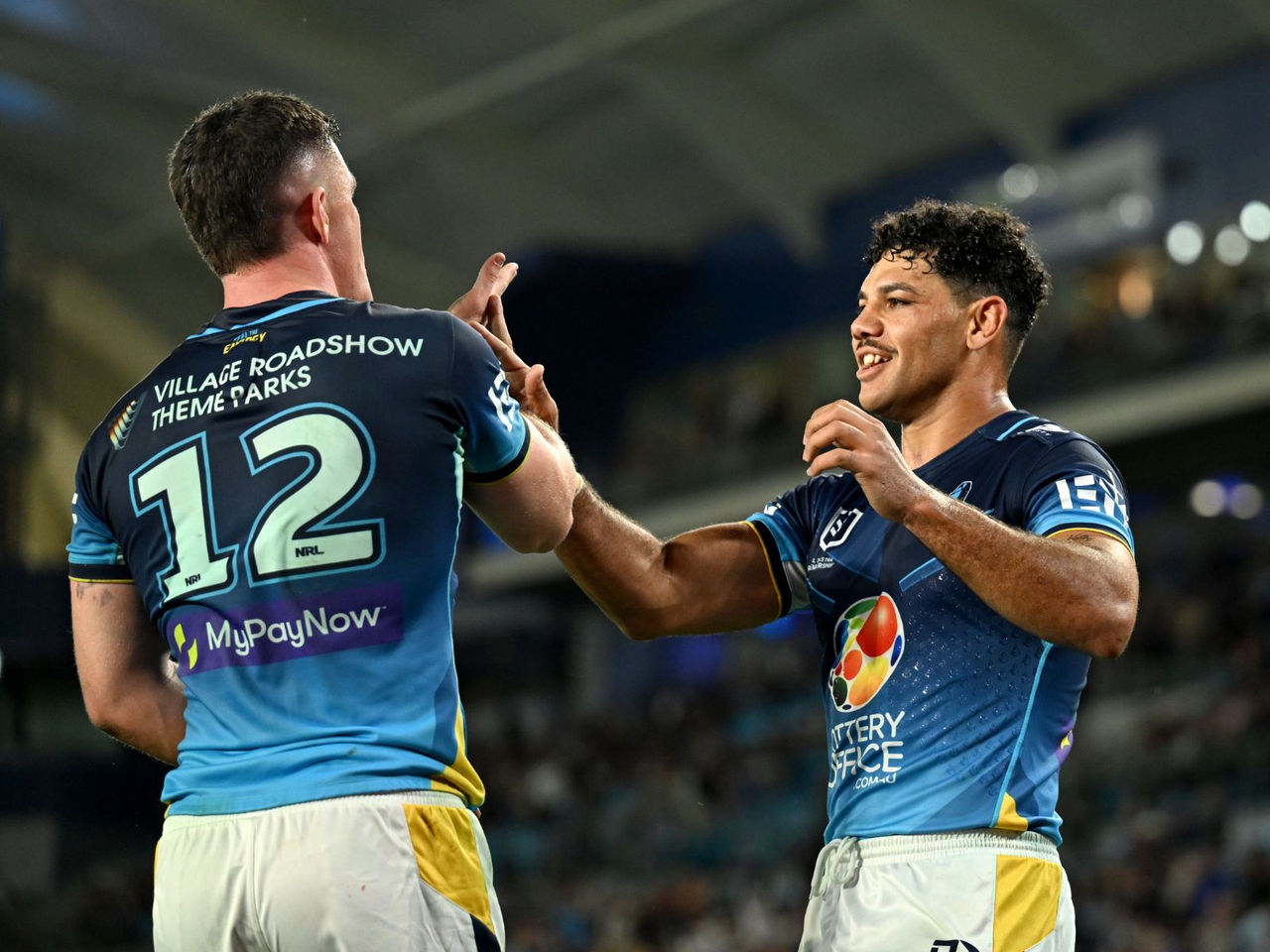 NRL Gold Coast Titans two players celebrating